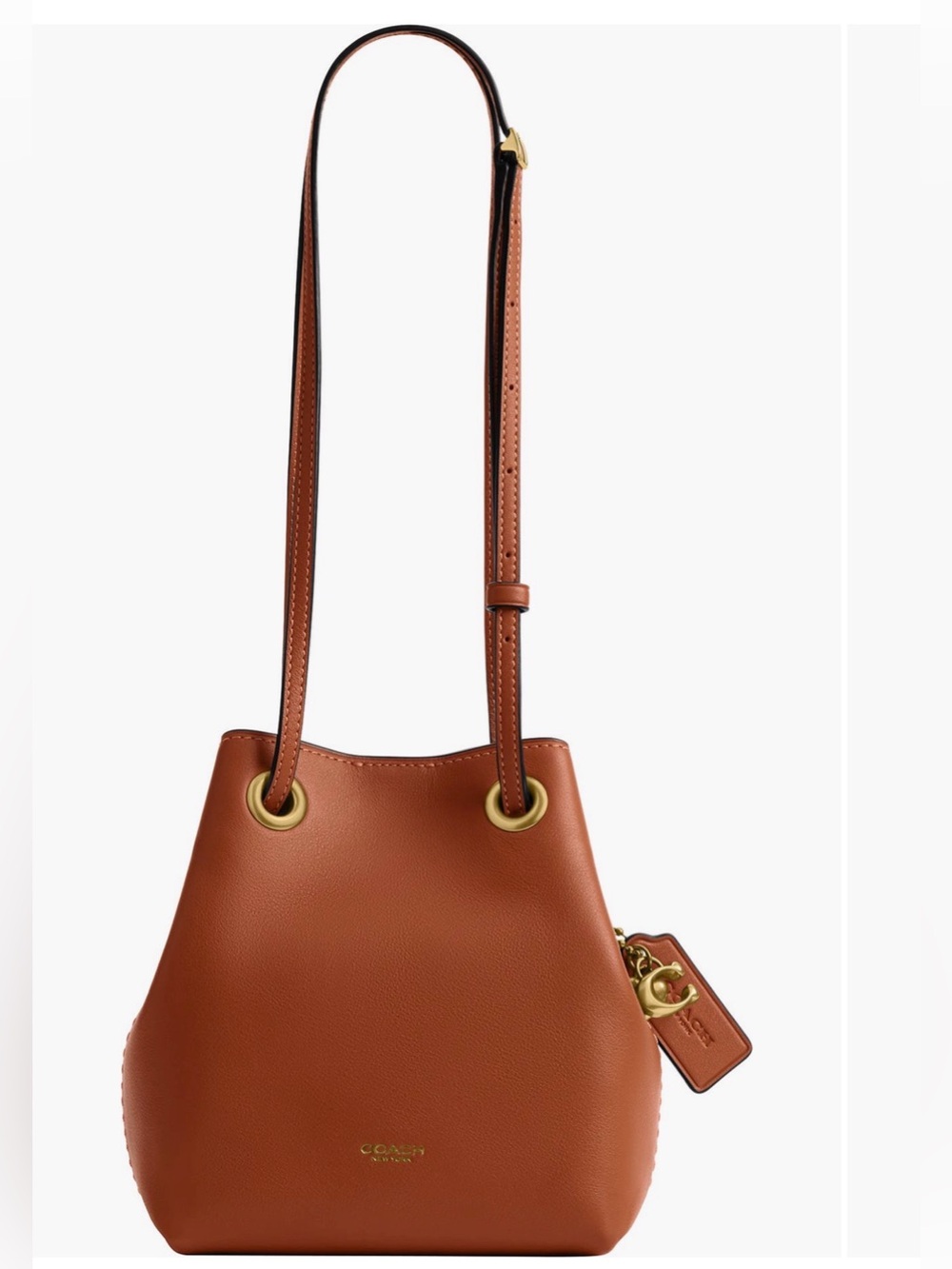 COACH
Jade Drawstring
Bucket Bag Amber Brown